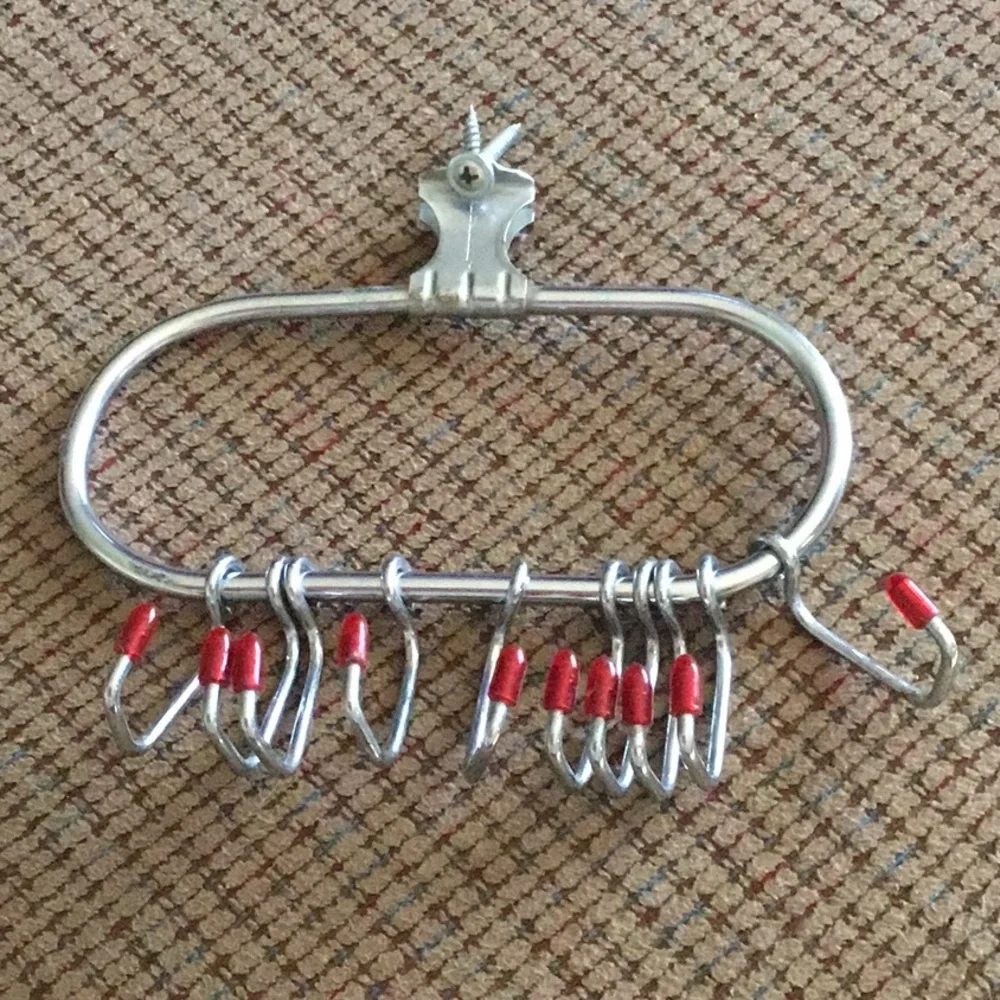 Belt, tie and scarf holder